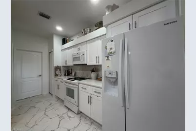 2260 Heritage Greens Dr, Naples, FL 34119 - Photo 10