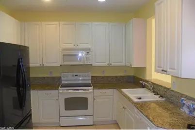 1400 Mariposa Cir #104, Naples, FL 34105 - Photo 4