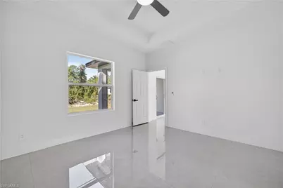 392 Charwood Ave S, Lehigh Acres, FL 33974 - Photo 18