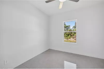 392 Charwood Ave S, Lehigh Acres, FL 33974 - Photo 24