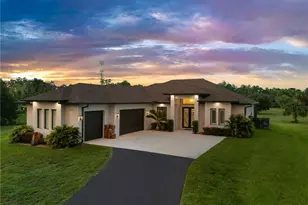 411 24th Ave NE, Naples, FL 34120 - Photo 2