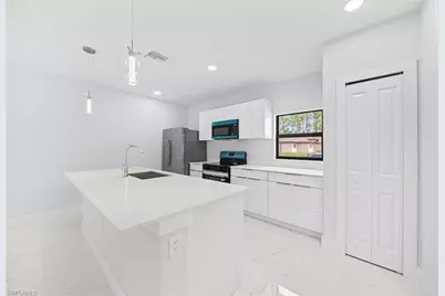 2505 1st St SW, Lehigh Acres, FL 33976 - Photo 10
