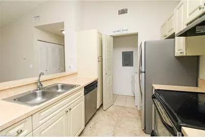 2214 Arbour Walk Cir #2026, Naples, FL 34109 - Photo 18