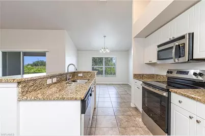 2616 70th St W, Lehigh Acres, FL 33971 - Photo 6
