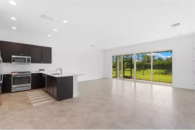 12445 Dahlia Ct, Naples, FL 34120 - Photo 2