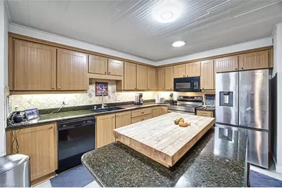 2490 Outrigger Ln, Naples, FL 34104 - Photo 18