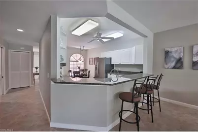 526 Lake Louise Cir #4-403, Naples, FL 34110 - Photo 6