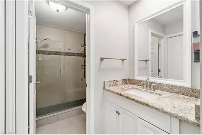 5700 Woodmere Lake Cir #E201, Naples, FL 34112 - Photo 16