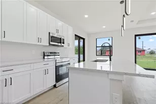 2704 37th St SW, Lehigh Acres, FL 33976 - Photo 6