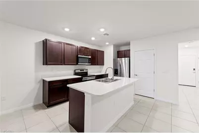 15381 Wildflower Cir, Naples, FL 34119 - Photo 6
