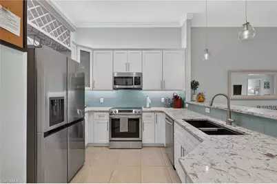 1285 Sweetwater Cv #2106, Naples, FL 34110 - Photo 8