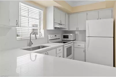 5 High Point Cir W #104, Naples, FL 34103 - Photo 12