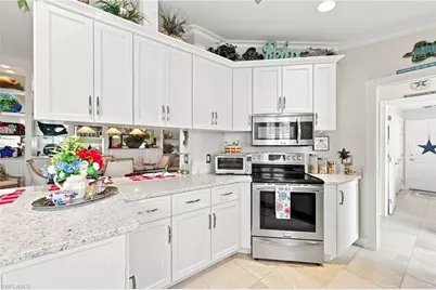 7677 Rozzini Ln, Naples, FL 34114 - Photo 8