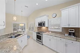 24833 Lakemont Cove Ln, Bonita Springs, FL 34134 - Photo 10