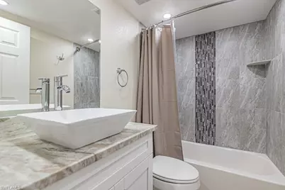 2562 Kings Lake Blvd #102, Naples, FL 34112 - Photo 16