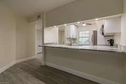 2562 Kings Lake Blvd #102, Naples, FL 34112 - Photo 8