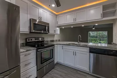 2562 Kings Lake Blvd #102, Naples, FL 34112 - Photo 10