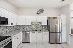 3207 Horse Carriage Way, Naples, FL 34105 - Photo 8