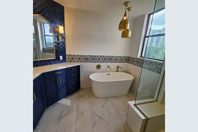 7040 Pelican Bay Blvd #D405, Naples, FL 34108 - Photo 14