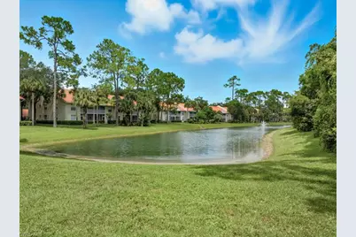 145 Robin Hood Cir #104, Naples, FL 34104 - Photo 1