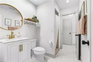 2472 Pinewoods Cir, Naples, FL 34105 - Photo 16