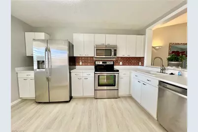 7749 Jewel Ln #202, Naples, FL 34109 - Photo 6