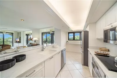 6020 Pelican Bay Blvd #404, Naples, FL 34108 - Photo 16