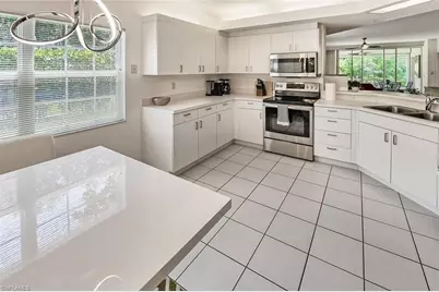 6910 Satinleaf Rd N #101, Naples, FL 34109 - Photo 8