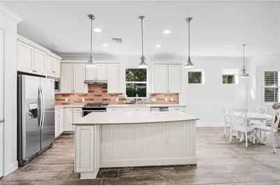 10647 Tiki Ct, Estero, FL 33928 - Photo 8
