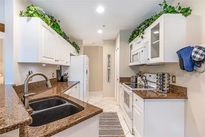 4680 Hawks Nest Way #D-103, Naples, FL 34114 - Photo 8