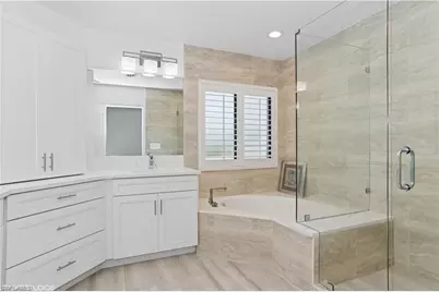 7048 Pelican Bay Blvd #C-105, Naples, FL 34108 - Photo 10