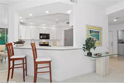 7048 Pelican Bay Blvd #C-105, Naples, FL 34108 - Photo 6
