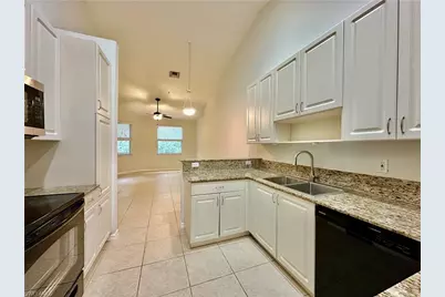 1425 Mariposa Cir #202, Naples, FL 34105 - Photo 8