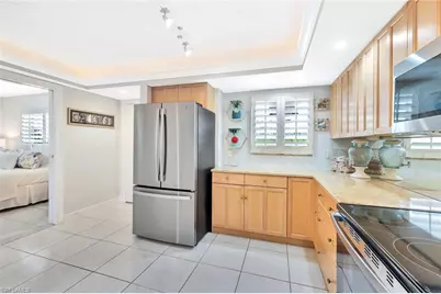 12945 Vanderbilt Dr #304, Naples, FL 34110 - Photo 10