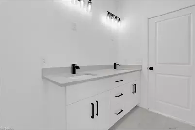 831 Bently St E, Lehigh Acres, FL 33974 - Photo 28