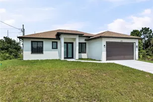 831 Bently St E, Lehigh Acres, FL 33974 - Photo 4