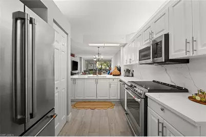 7502 Silver Trumpet Ln #103, Naples, FL 34109 - Photo 8