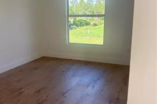 829 Downer Ave S, Lehigh Acres, FL 33974 - Photo 4