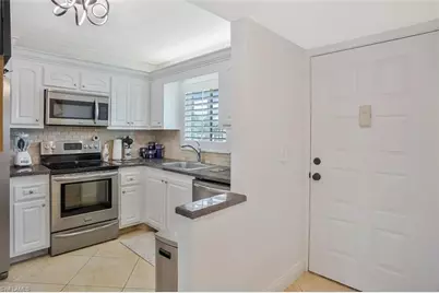 4318 27th Ct SW #101, Naples, FL 34116 - Photo 6