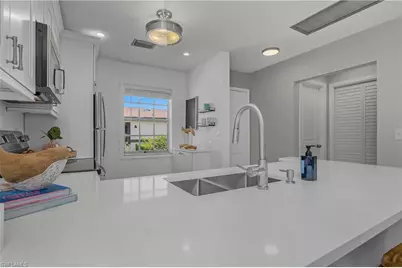 1071 Pine Isle Ln #1071, Naples, FL 34112 - Photo 2
