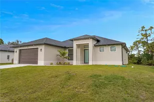 717 Theodore Vail St E, Lehigh Acres, FL 33974 - Photo 1