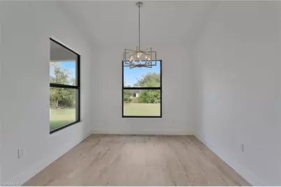 715 Theodore Vail St E, Lehigh Acres, FL 33974 - Photo 8