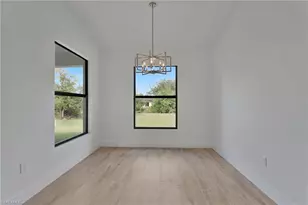 715 Theodore Vail St E, Lehigh Acres, FL 33974 - Photo 8