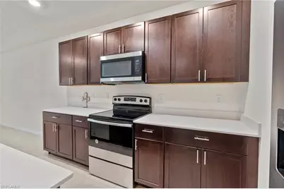 15535 Wildflower Cir, Naples, FL 34119 - Photo 6