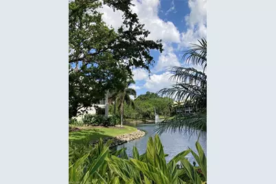 6371 Pelican Bay Blvd #N8, Naples, FL 34108 - Photo 6