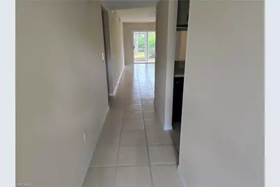5750 Woodmere Lake Cir #H101, Naples, FL 34112 - Photo 2