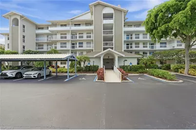 360 Horse Creek Dr #207, Naples, FL 34110 - Photo 1