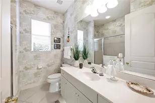 5872 Whisperwood Ct, Naples, FL 34110 - Photo 12