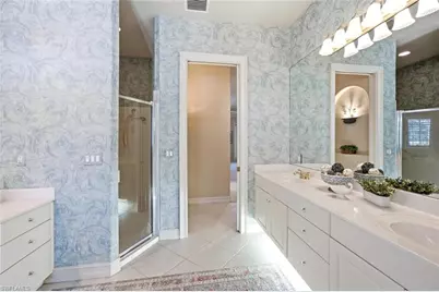 5872 Whisperwood Ct, Naples, FL 34110 - Photo 10