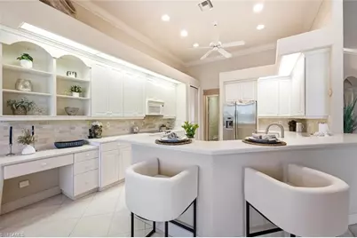 5872 Whisperwood Ct, Naples, FL 34110 - Photo 4